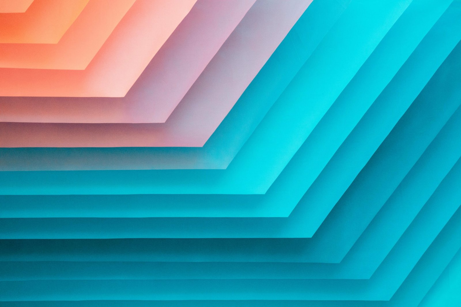 Servicios Abstract geometric pattern with colorful gradient layers in vibrant hues, perfect for backgrounds.